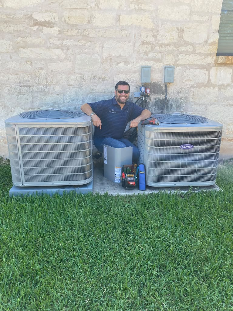Chris Anthony, owner of Cool Bear Service Group, with freshly installed AC units