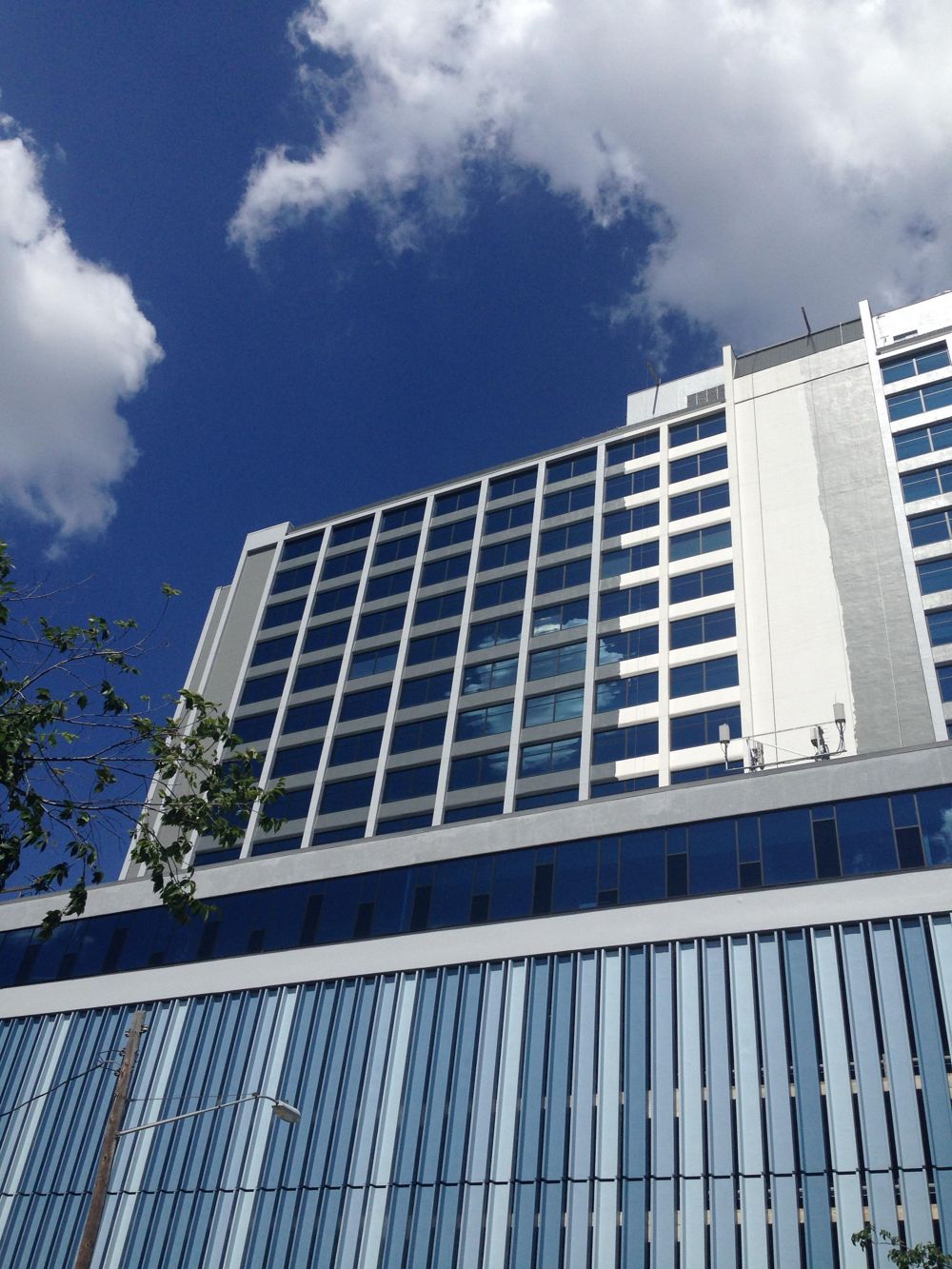 Repainted commercial building facade under a blue sky