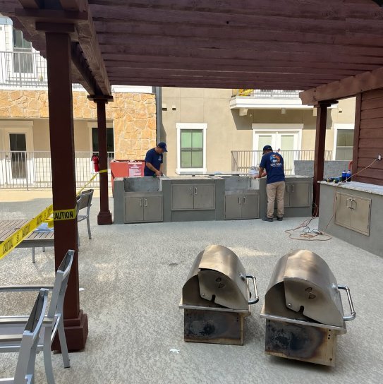 Old grills removed during the poolside grill area refresh in San Marcos, Texas